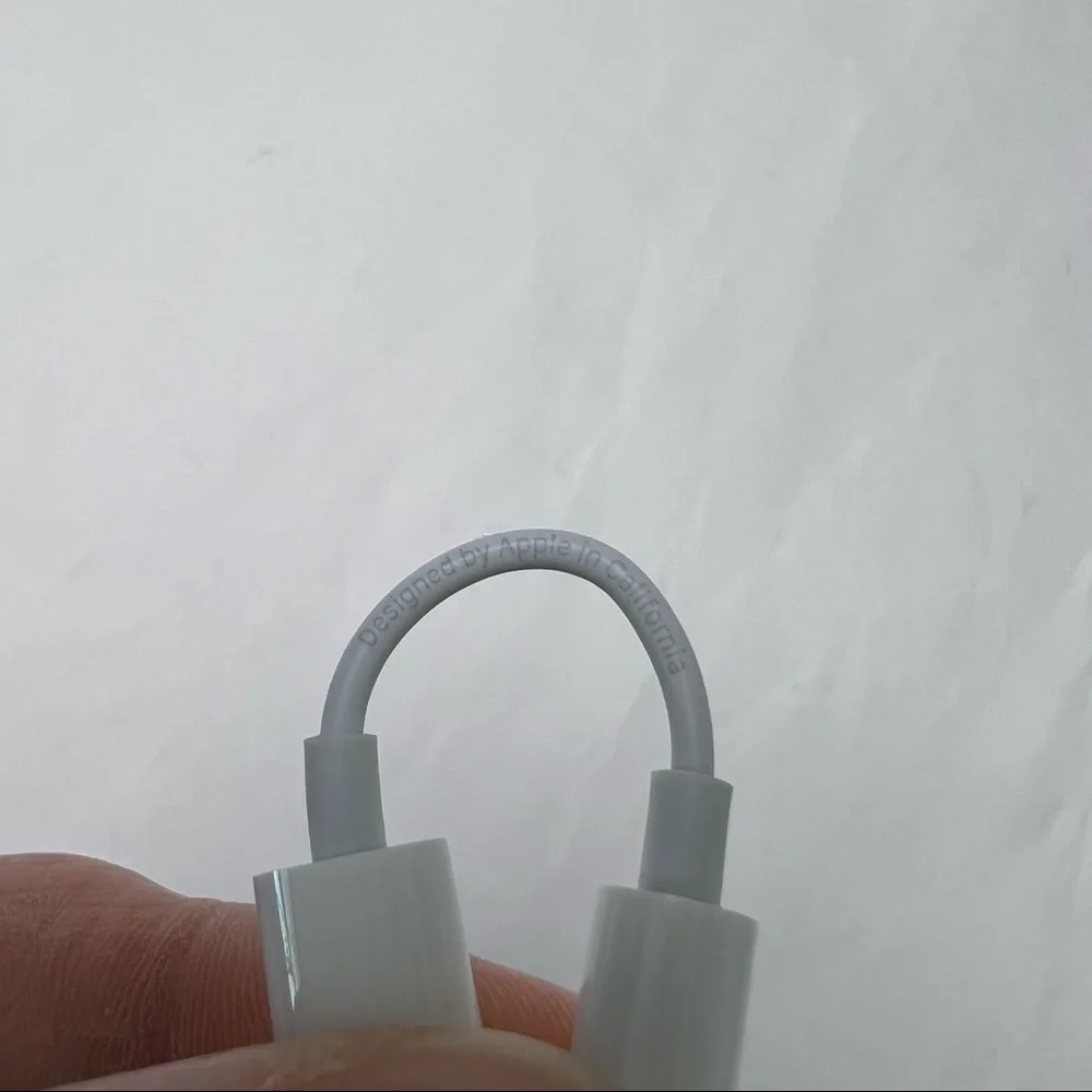 Never Used - Apple Adapter - 3.5mm headphone jack to lightning port adapter